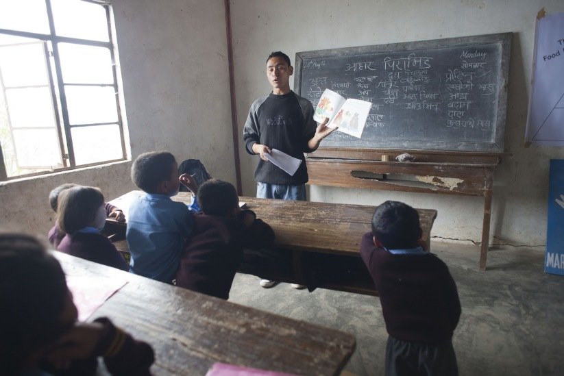Community Health Worker in Indian Classroom